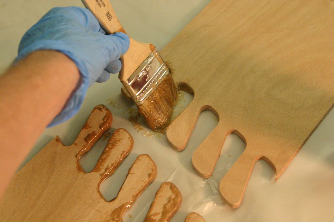 Puzzle joints shown with epoxy being applied
