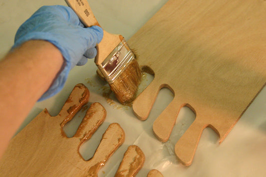 Puzzle joints shown with epoxy being applied