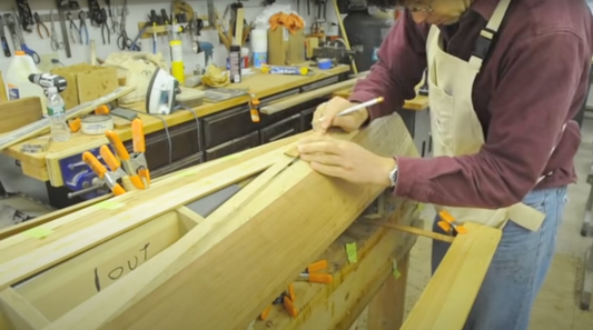 Stripping up the bottom of the kayak