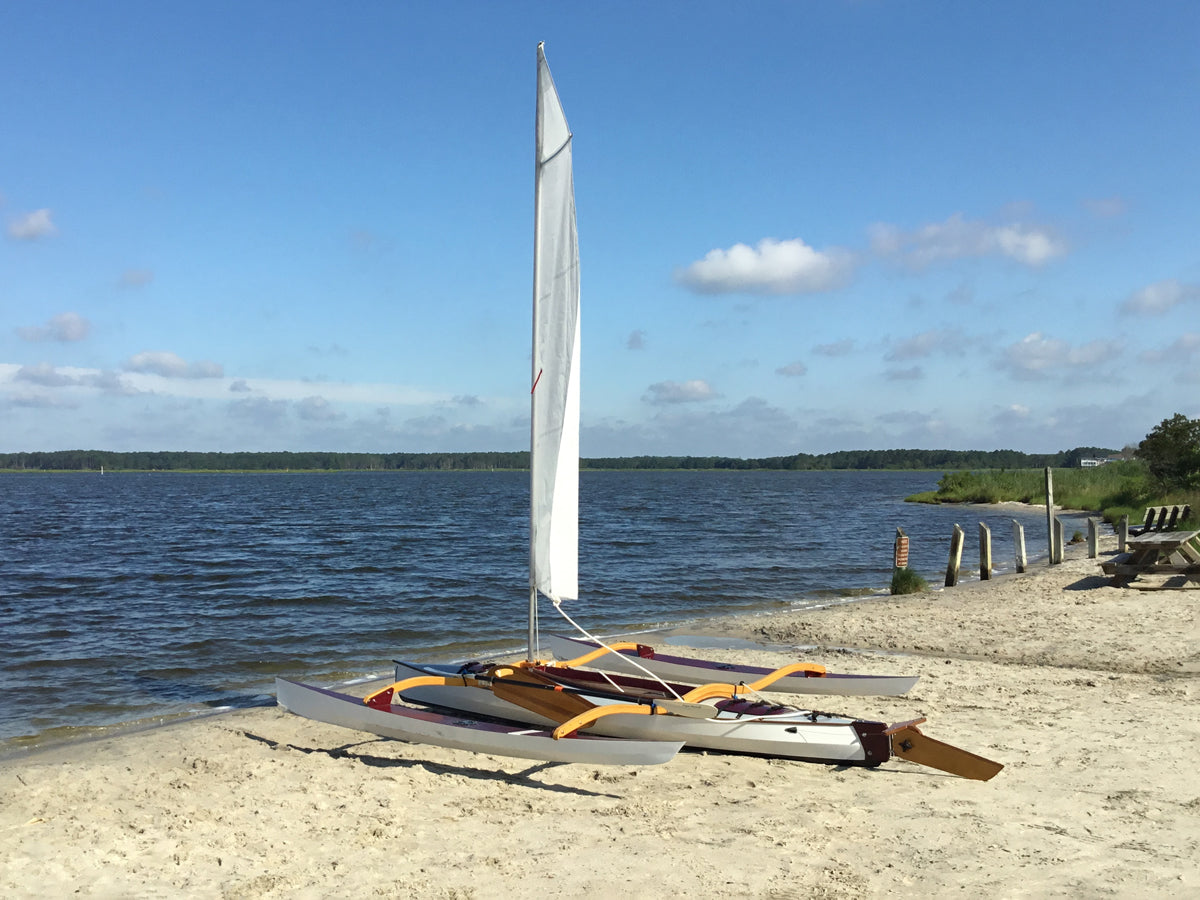 Show Full Screen Louis M. built this kayak and CLC SailRig, seen here on Little Assawoman Bay in Fenwick Island, Delaware.