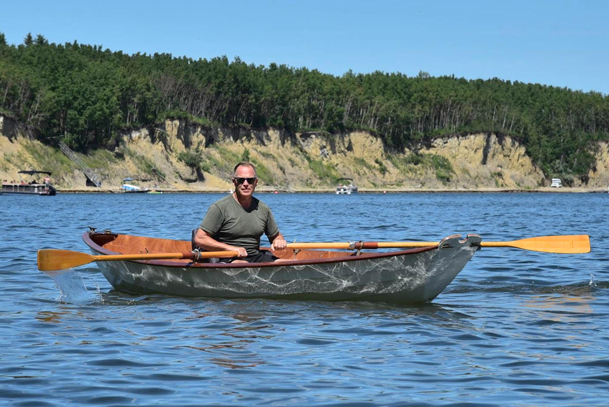 Graham T. rowing his glistening Northeaster Dory