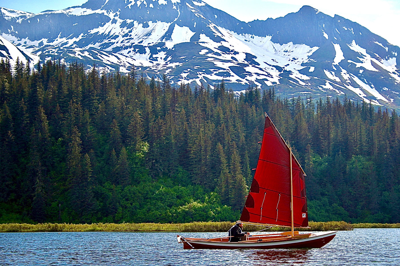 Jason S. sailing a Northeaster Dory on  beautiful Lake Valdez, Alaska.
