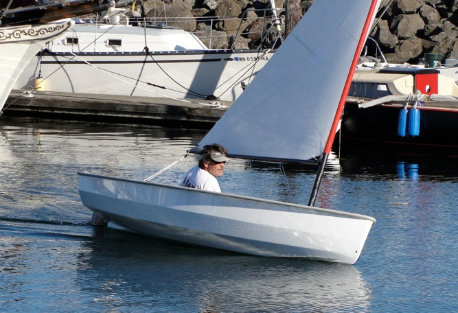 PT Spear Dinghy sailing in tight quarters in a ghost of a wind.