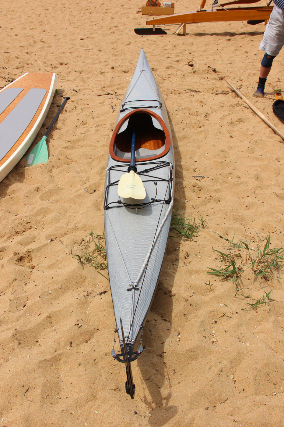 Frank S. wrapped his Petrel with "aluminized" fiberglass, giving it a Moire appearance.