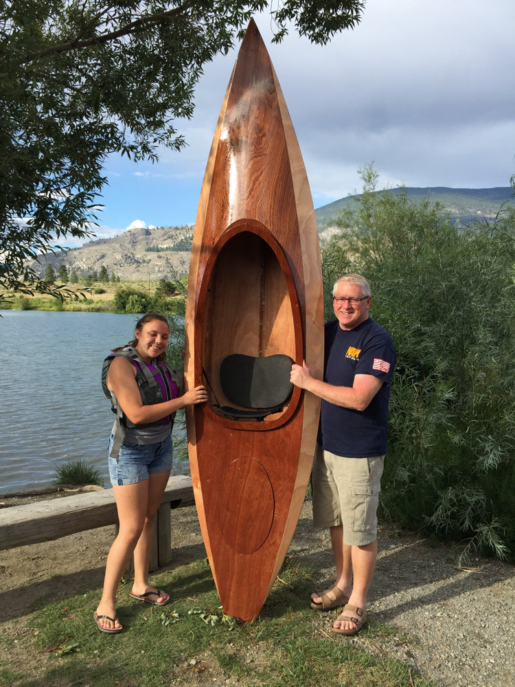 Marty A. of Pleasant Prairie, WI, and his young companion show off his Wood Duck 10 kayak near the water