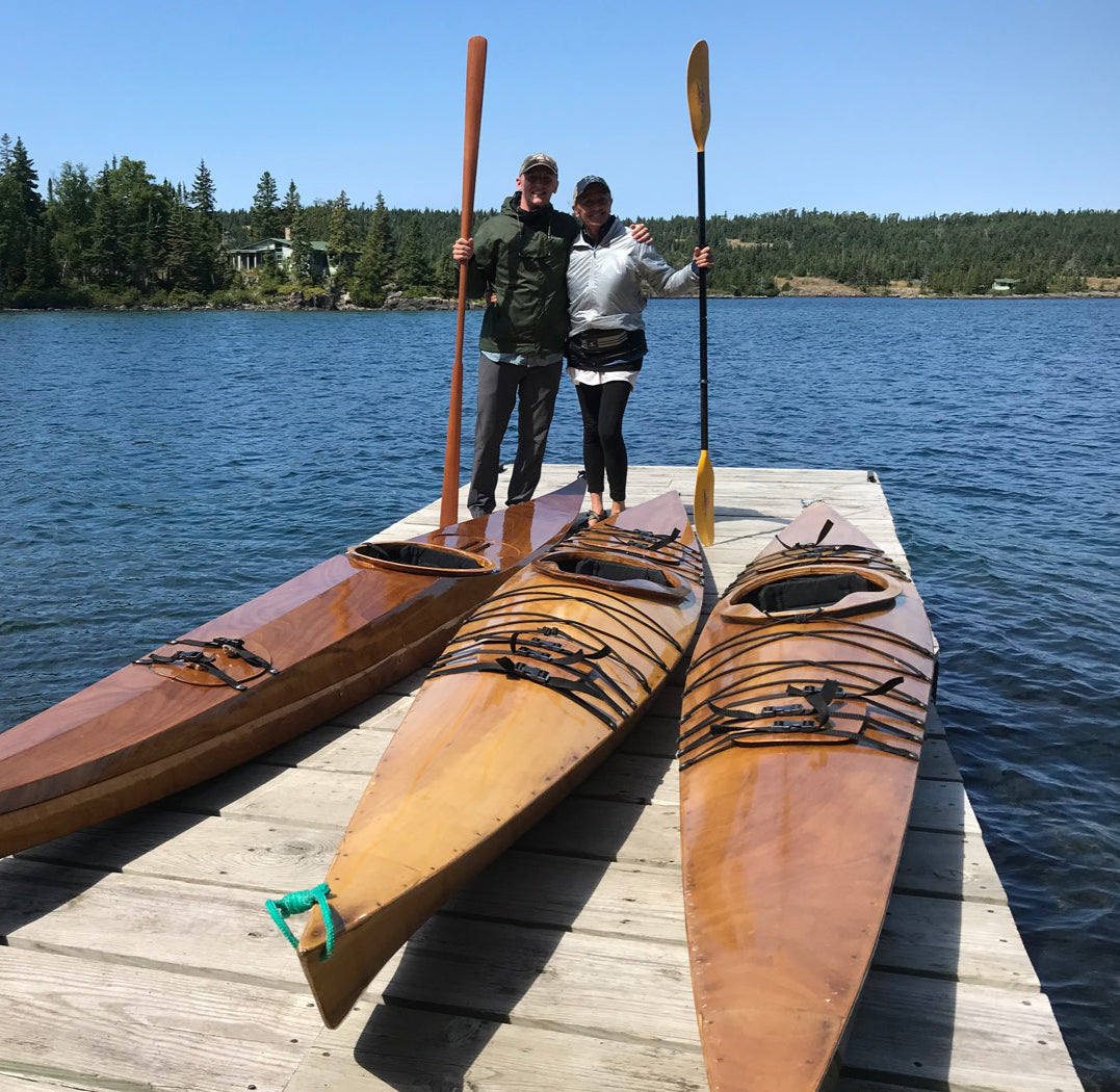 Chesapeake 16 and 16LT wooden kayaks built by James N. on a dock in Isle Royale National Park, Lake Superior