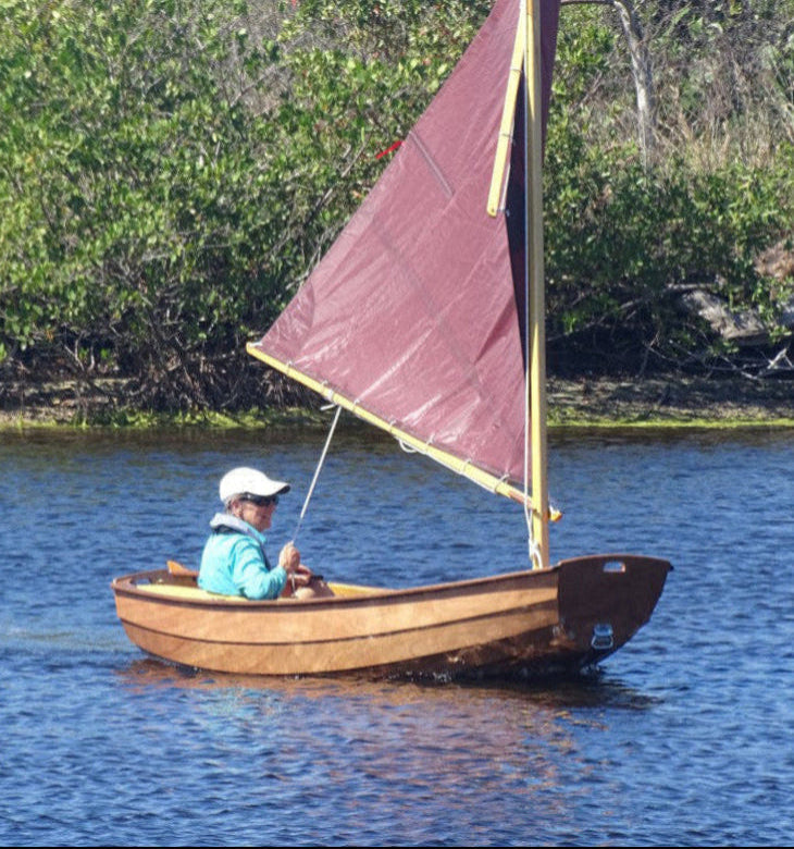 Gail H. sailing the Eastport Nesting Pram that she built.