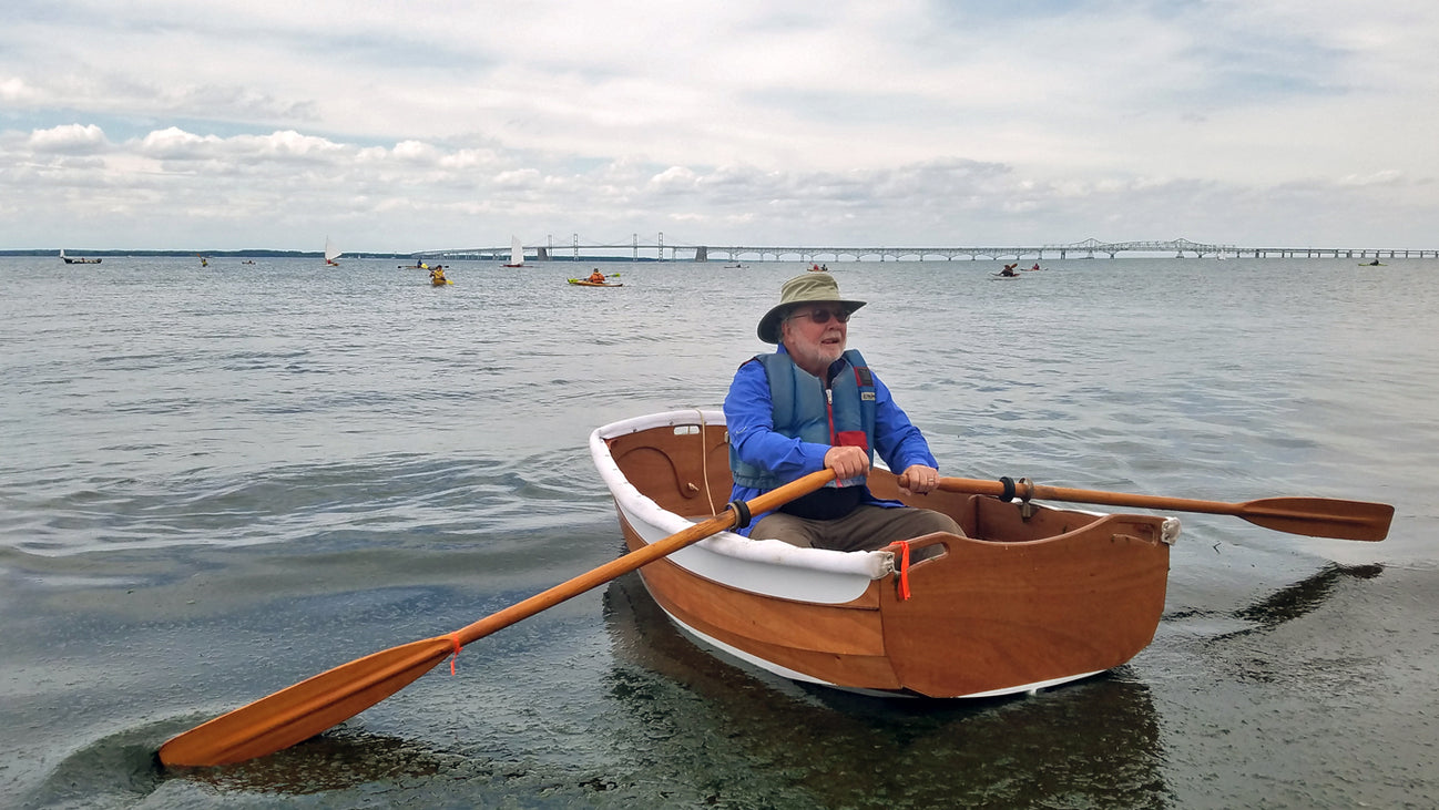Terry O. rowing an Eastport Ultralight Dinghy at a recent Okoumefest.