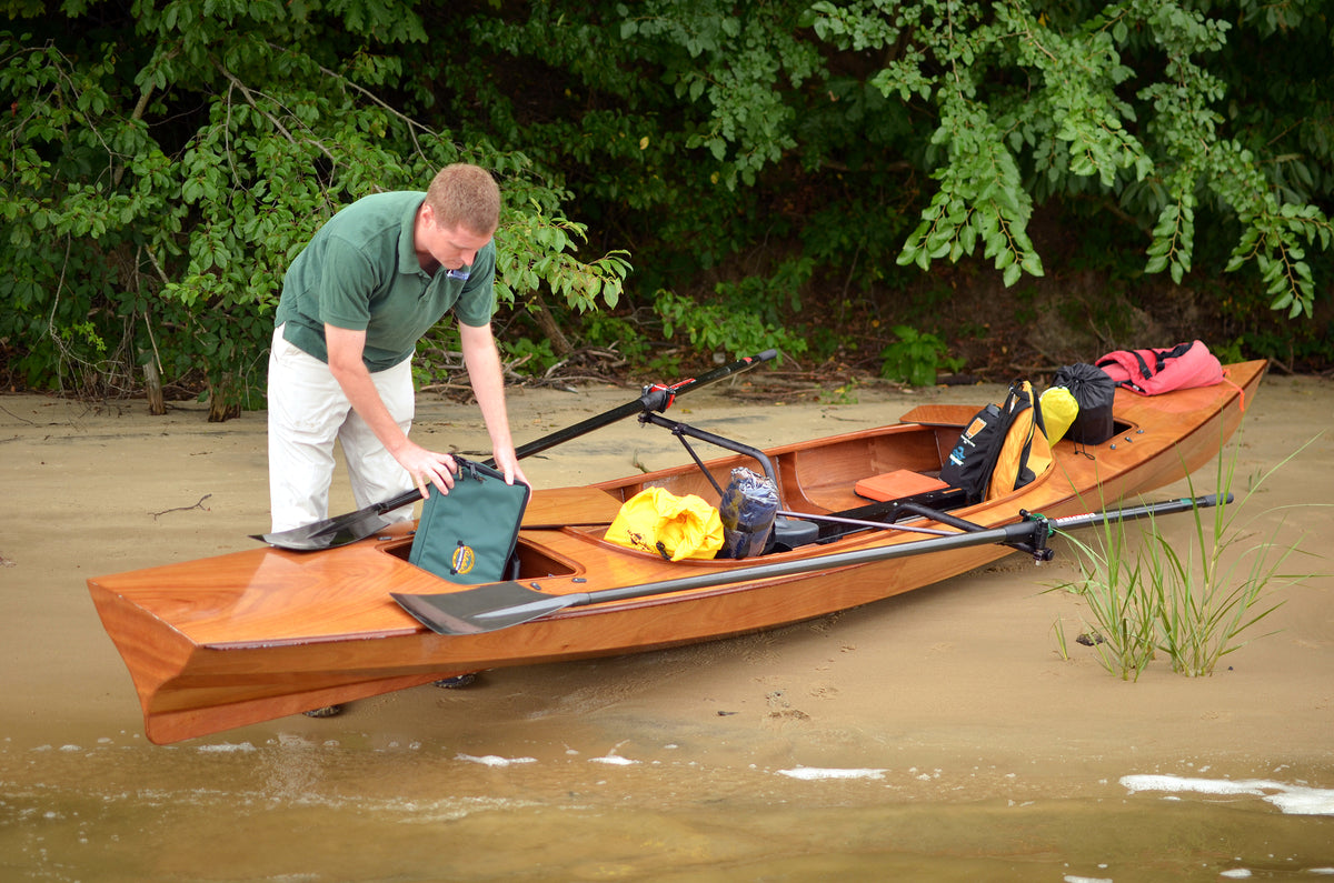 Expedition Wherry beached, unpacking gear.