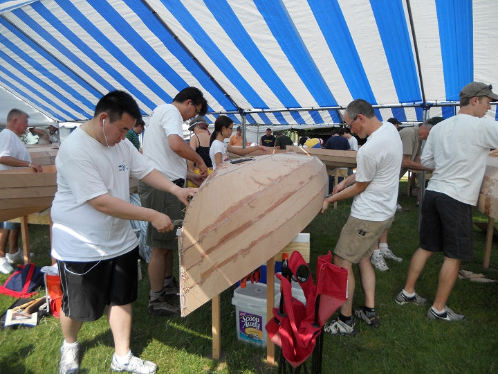 Nine families built Sassafras 16 canoes over a weekend at the 2010 WoodenBoat Show. Image by Grace Ombry