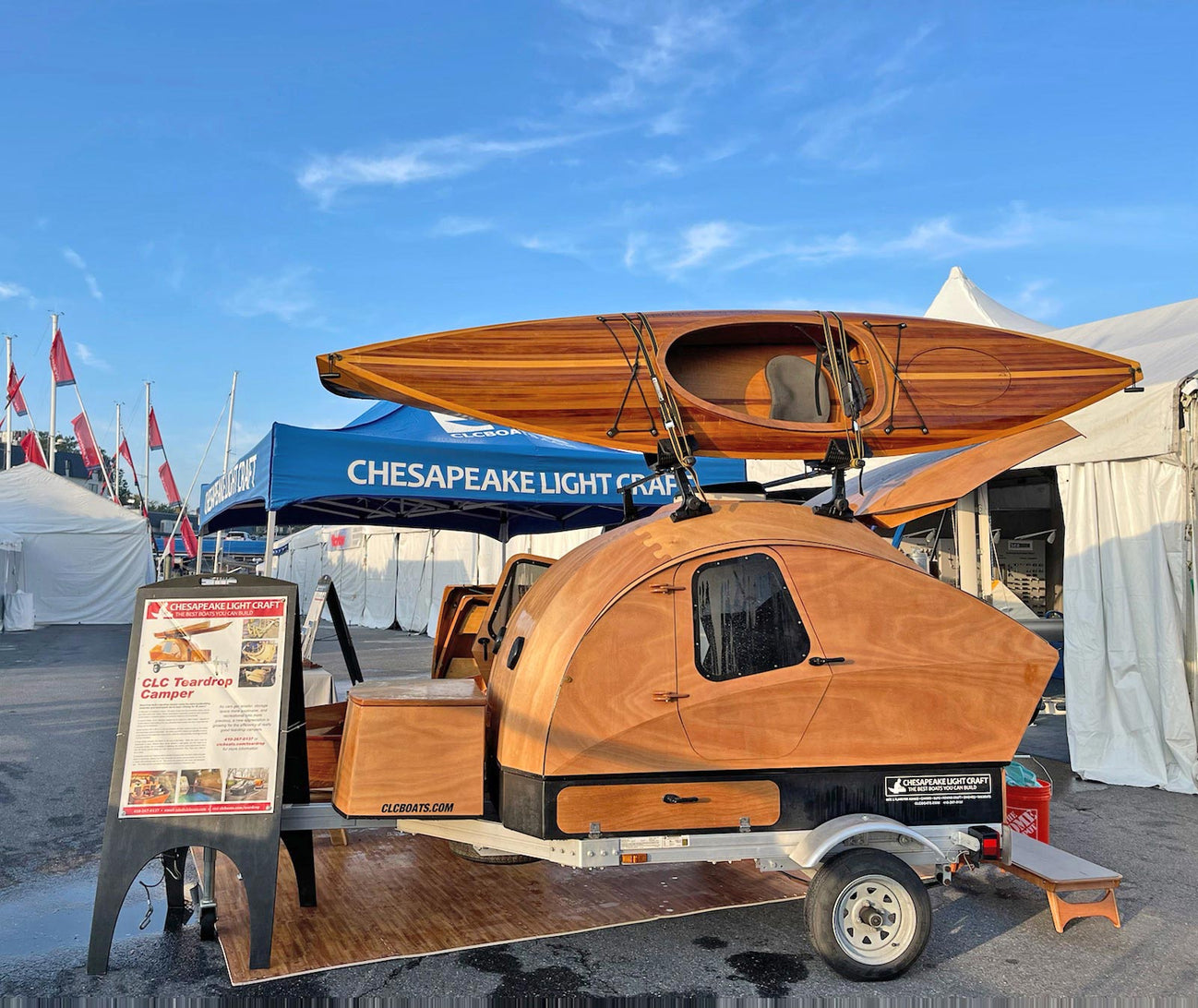 Wooden Camper trailer by Chesapeake Light Craft with Wooden Kayak on roof