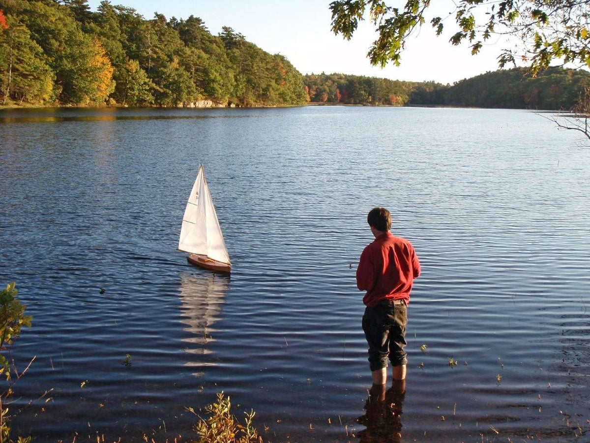 Independence R/C Sailboat model sailing in a lake.
