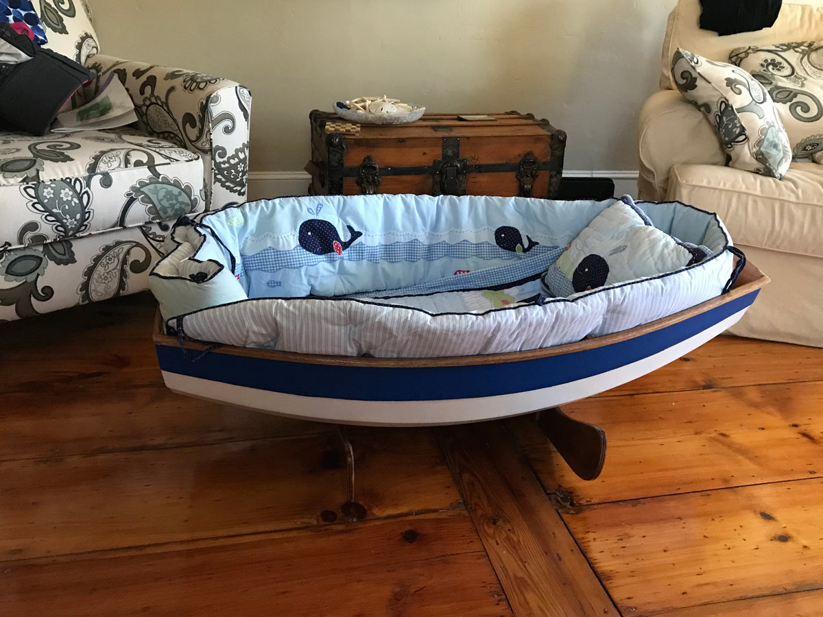 Jeffrey C built the Cradle Boat. His wife made the quilt. Lucky Lucky Baby