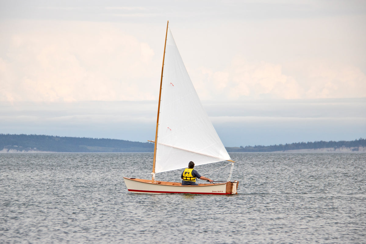Jimmy Skiff II sailing just off Port Townsend, WA during the Wooden Boat Festival.