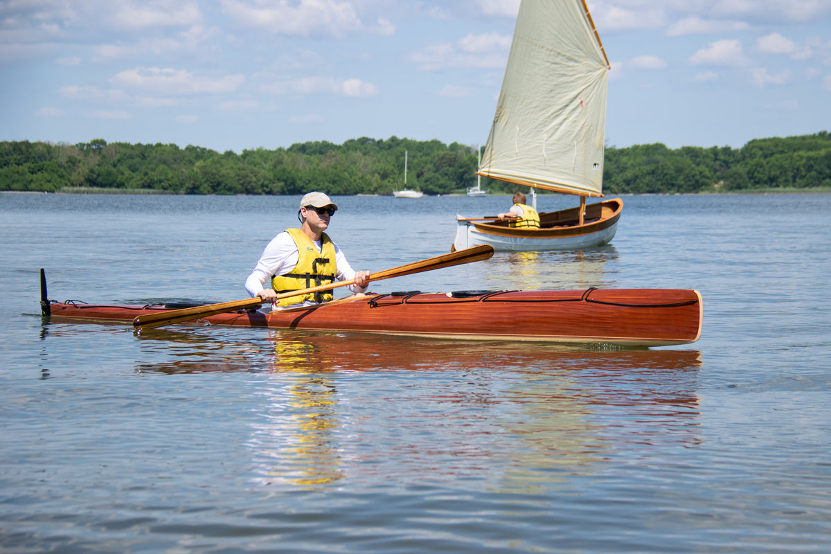 With its wrap-around deck evoking its Bootlegger lineage, the Runner moves with beauty and grace through the water.