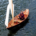 John Harris sailing a Northeaster Dory sailing under sloop rig. Thumbnail