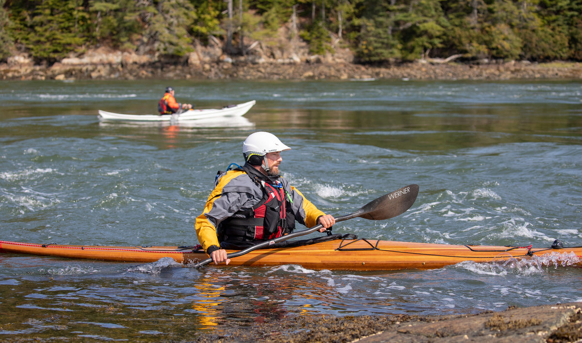 Guillemot Play strip-planked kayak being paddled during the Schoodic Sea-Kayak Retreat in Maine in 2021.