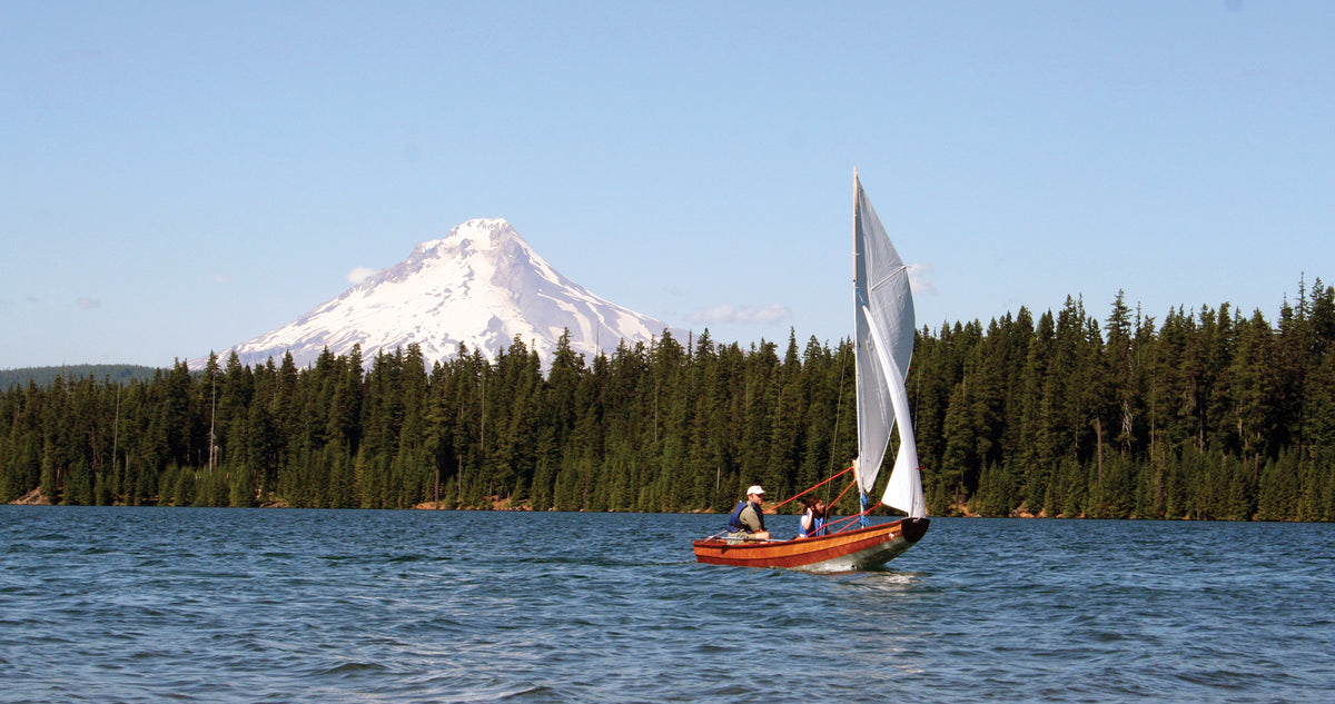 Linda and Eric M sailing their Passagemaker Standard on a perfect day on Lake Timothy in Oregon.