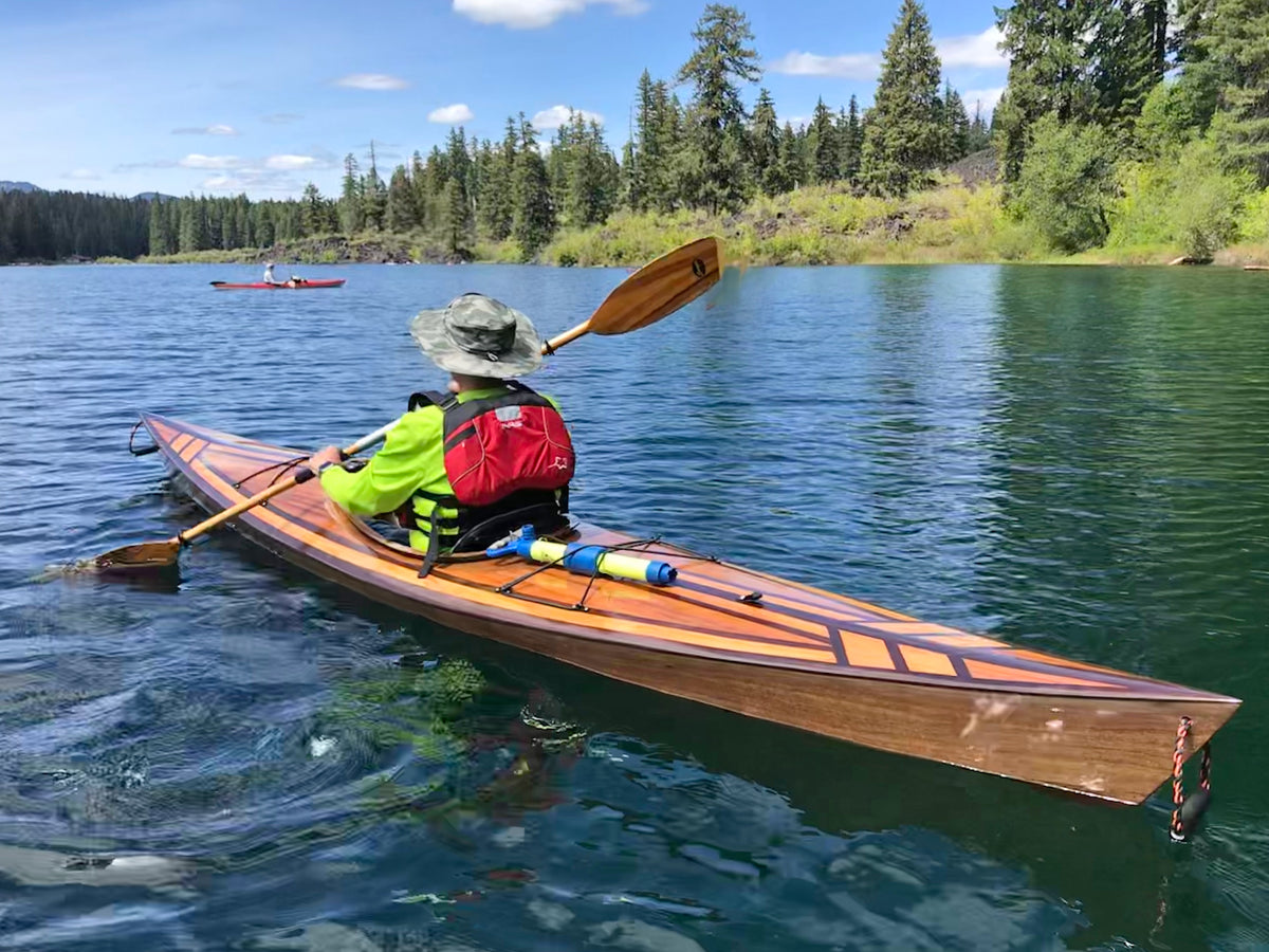 D.C. built this Shearwater Sport Hybrid with a geometric pattern on the deck. He is paddling on Clear Lake in Lin County, Oregon
