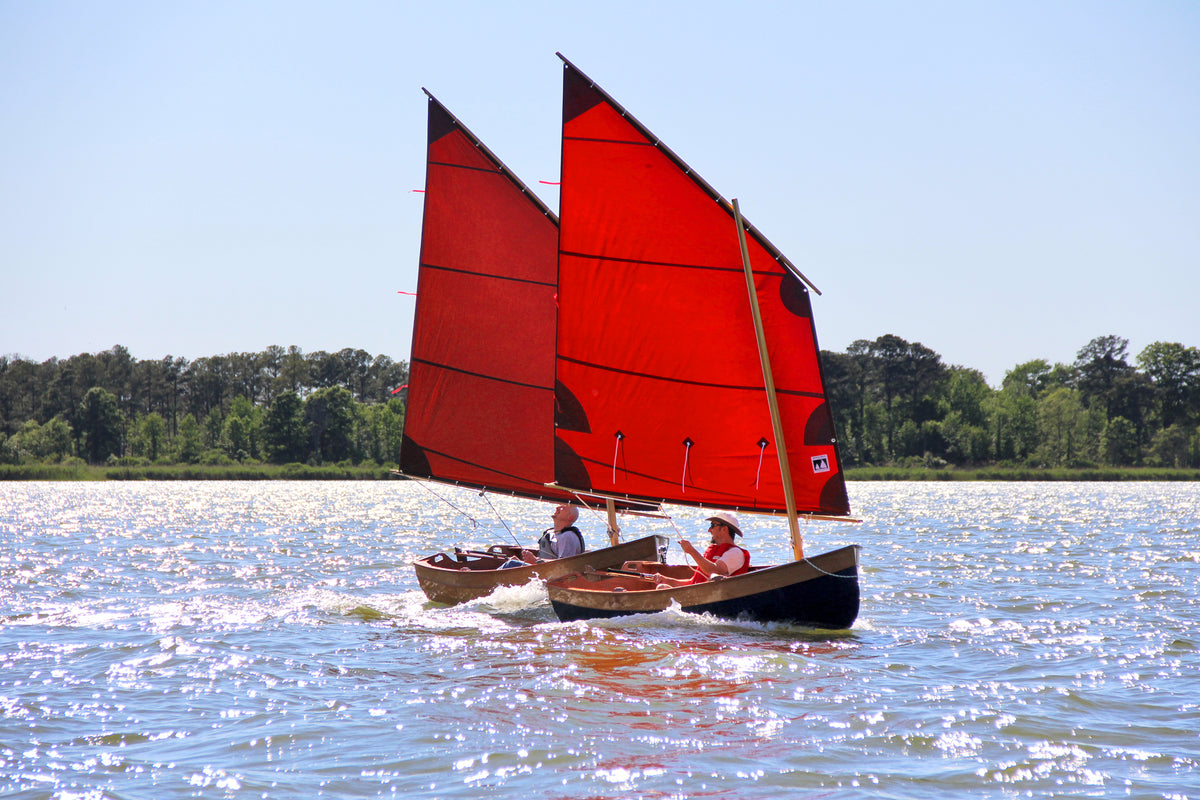 A pair of Tenderly Dinghies sailing in Maryland's Eastern Bay.