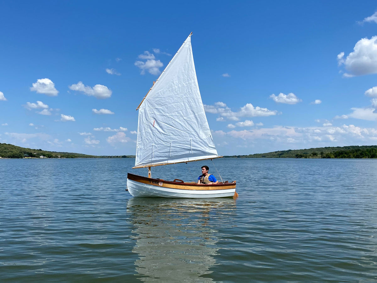 Stephen L on a quiet sail in his Tenderly Dinghy.
