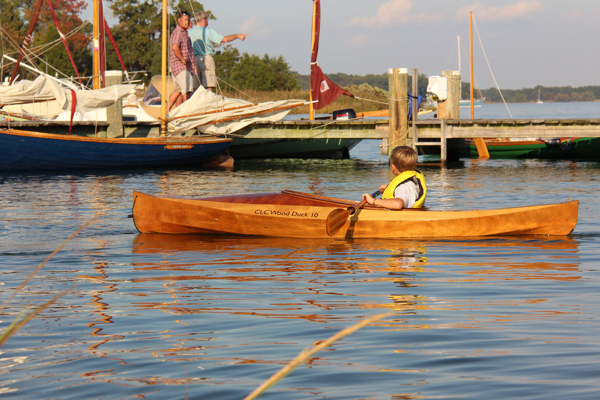 Child paddling a Wood Duck 10 kayak at the Mid-Atlantic Small Craft Festival in St. Michaels, Maryland