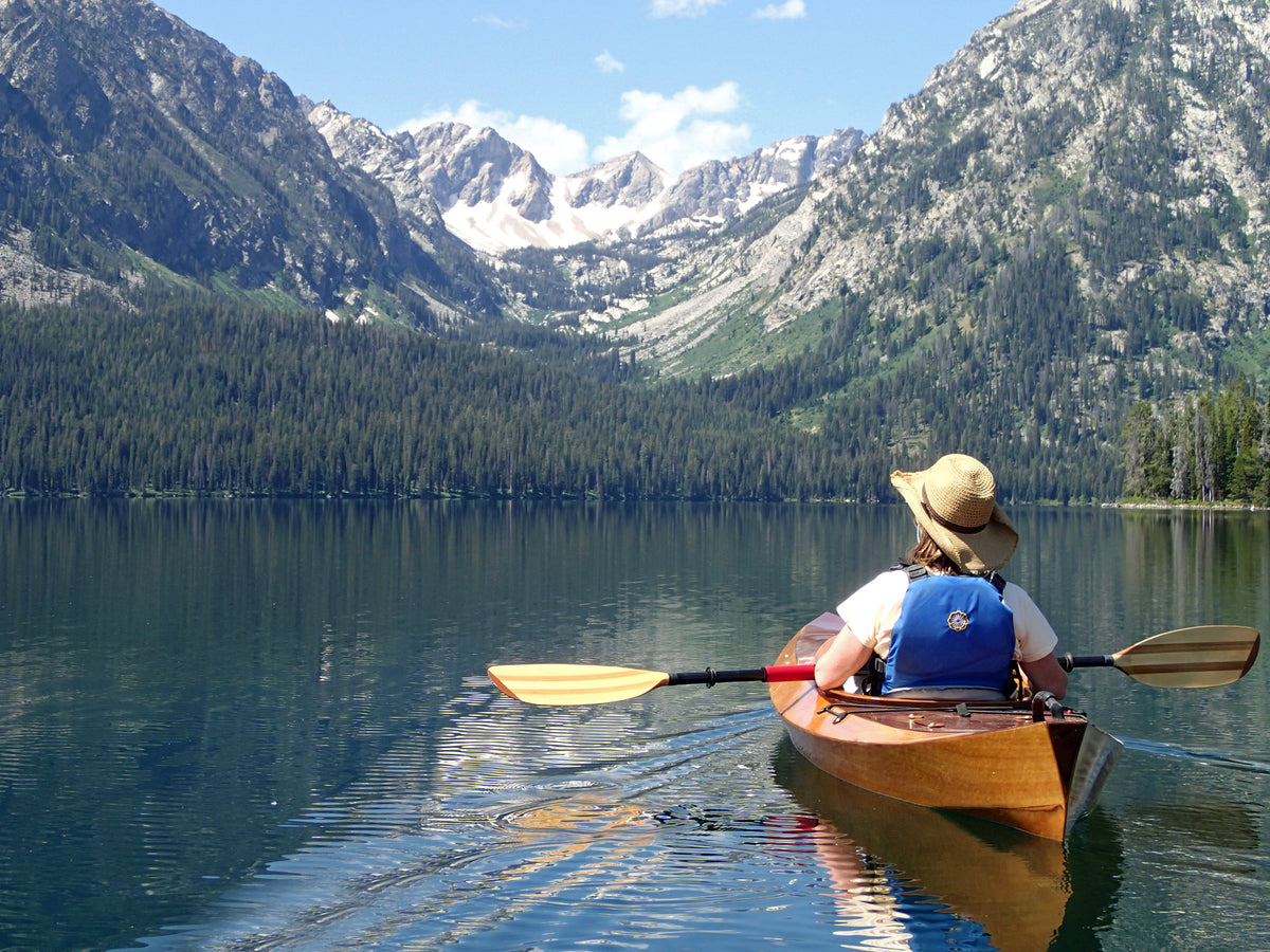 Cheryl J. enjoys a gorgeous day paddling her Wood Duck 14 kayak in Wyoming's Grand Teton National Park.