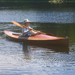 A woman paddling a Wood Duck 12 kayak Thumbnail