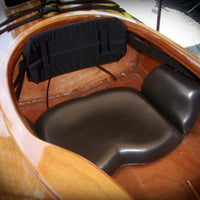 Wooden kayak cockpit and the seat and backband within.