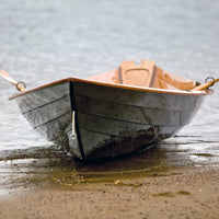 Northeaster Dory hull with spoon blade oars