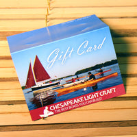 clc giftcard on strip-planked kayak deck