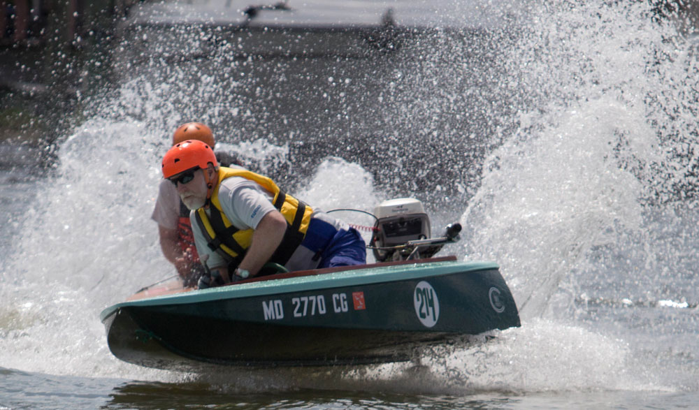 On a turn, Jim S's  Cocktail Class Racer RIVER MADNESS is almost out of the water. 
