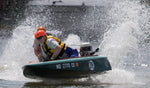On a turn, Jim S's  Cocktail Class Racer RIVER MADNESS is almost out of the water.  Thumbnail