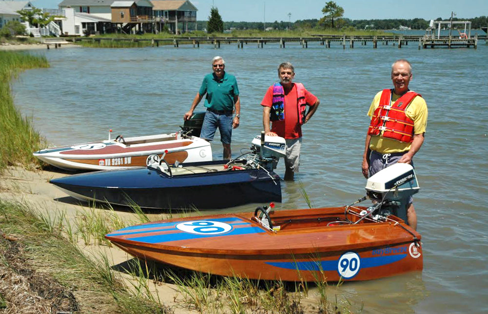 Arthur H. built BAY BREEZE, visible in the foreground. Two other Cocktail Class Racers and their drivers are also visible 