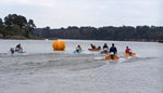 Cocktail Class Racers negotiating a turn around the large yellow buoy. Thumbnail