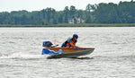 Ed W. leans over the bow of BLUE WAVE to get his Cocktail Class Racer to plane better. Thumbnail