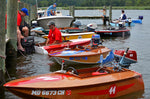 Cocktail Class Racers tied up to the dock awaiting their next race. Thumbnail