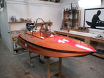 Racing graphics applied on bow and sides on CLC's Cocktail Class Racer DARK AND STORMY. Thumbnail