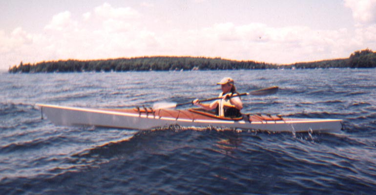 Sally W. paddling her Chesapeake 16LT wooden kayak