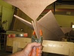 Pinching the garboards together at the transom before wiring them on this Annapolis Wherry Tandem kit. Thumbnail