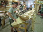 Sewing a plank onto an Annapolis Wherry Tandem boat kit. Thumbnail