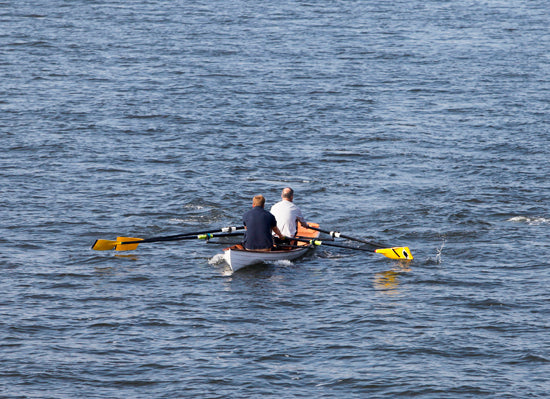 Two men rowing an Annapolis Tandem Wherry
