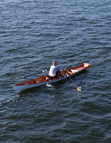 A solo rower in an Annapolis Tandem Wherry