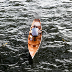 A man rowing an Annapolis Wherry Tandem Thumbnail