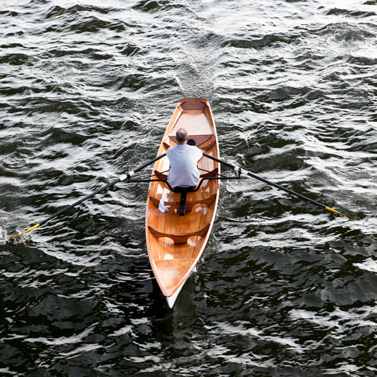 A man rowing an Annapolis Wherry Tandem