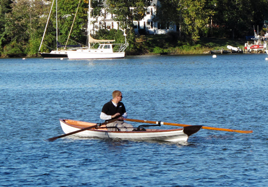 A man rowing an Annapolis Wherry Tandem