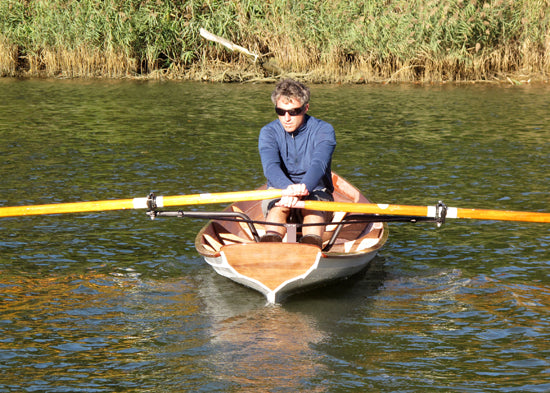 A man rowing an Annapolis Wherry Tandem