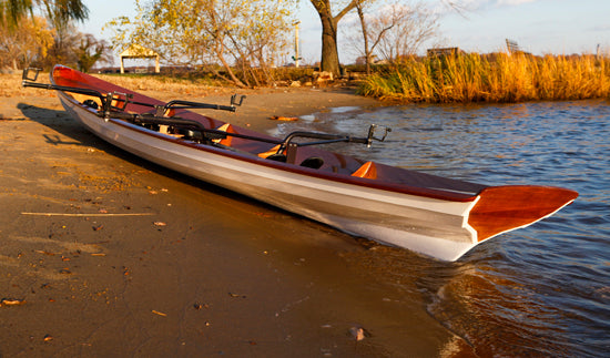 An Annapolis Tandem Wherry pulled up on a beach