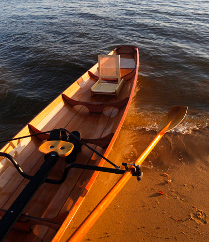 An Annapolis Wherry Tandem with a single rowing unit and a cane passenger seat