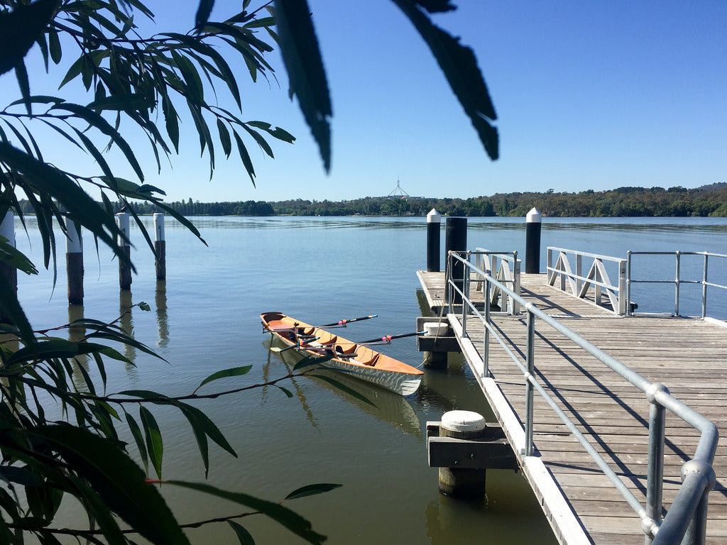 An Annapolis Wherry Tandem built by Bill R. tied to a dock